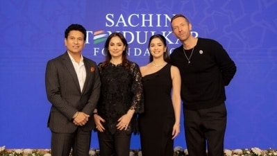 Sachin Tendulkar, Anjali Tendulkar, and Sara Tendulkar with Chris Martin at the 5-year anniversary celebration of The Sachin Tendulkar Foundation. Sachin Tendulkar, Anjali Tendulkar, and Sara Tendulkar with Chris Martin at the 5-year anniversary celebration of The Sachin Tendulkar Foundation.