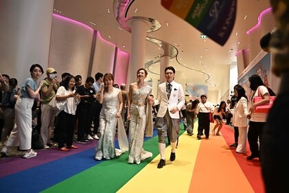 Couples attend a marriage registration event at Paragon shopping mall in Bangkok Couples attend a marriage registration event at Paragon shopping mall in Bangkok
