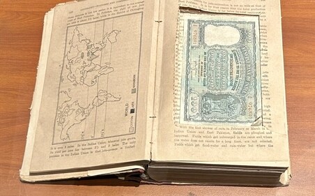 Currency stuffed inside the hollows of a book. (Preeti Verma Lal)