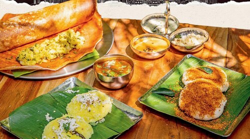 At Muttuswami Cafe, Mumbai, enjoy their traditional menu of dosa, idli, and other regional specialties. At Muttuswami Cafe, Mumbai, enjoy their traditional menu of dosa, idli, and other regional specialties.