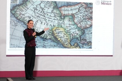 Mexico's President Claudia Sheinbaum shows a 1661 world map showing the Americas and the Gulf of Mexico in response to U.S. President-elect Donald Trump's comments about renaming the body of water, during a press conference at National Palace in Mexico City, Mexico, in this photo distributed on January 8, 2025. (Reuters)