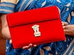 Budget 2025: The Budget tablet, carried by the finance minister, is wrapped in a traditional 'Bahi-Khaata' style pouch.