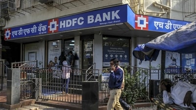 Saturday bank holiday: Pedestrian walk past an HDFC Bank Ltd. branch in Mumbai, India, (Bloomberg) Saturday bank holiday: Pedestrian walk past an HDFC Bank Ltd. branch in Mumbai, India, (Bloomberg)