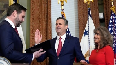 Vice President JD Vance swears in John Ratcliffe as CIA Director as his wife Michele holds the Bible (AP) Vice President JD Vance swears in John Ratcliffe as CIA Director as his wife Michele holds the Bible (AP)
