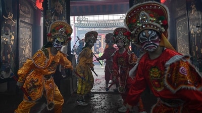 In China, there's a traditional dance called Yingge dance. This is called the dance of the ‘heroes.' This is ahead of the Lunar New Year. The dancers don traditional costumes for the dance. The ancient dance form gained popularity on platforms like Douyin, the Chinese version of TikTok. (Photo by JADE GAO / AFP) In China, there's a traditional dance called Yingge dance. This is called the dance of the ‘heroes.' This is ahead of the Lunar New Year. The dancers don traditional costumes for the dance. The ancient dance form gained popularity on platforms like Douyin, the Chinese version of TikTok. (Photo by JADE GAO / AFP)