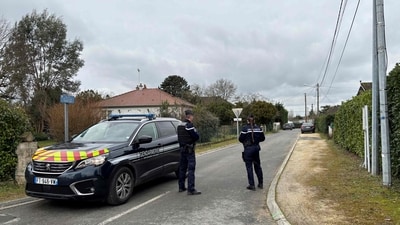 French gendarmes stand alert on a street in Mereau, near Vierzon, central France on January 23, 2025, as they secure the area following the kidnapping of David Ballard - the co-founder of a company specialising in securing cryptoassets. (AFP) French gendarmes stand alert on a street in Mereau, near Vierzon, central France on January 23, 2025, as they secure the area following the kidnapping of David Ballard - the co-founder of a company specialising in securing cryptoassets. (AFP)