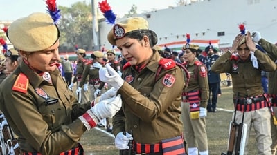 Police personnel prepare before taking part in rehearsals for the country's upcoming Republic Day parade in Amritsar (AFP/Narinder NANU ) Police personnel prepare before taking part in rehearsals for the country's upcoming Republic Day parade in Amritsar (AFP/Narinder NANU )