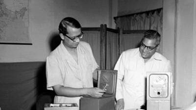 India’s first chief election commissioner Sukumar Sen (left) and commission secretary PS Subramaniam, check ballot boxes ahead of the first general elections, in October 1951. (HT Archive)