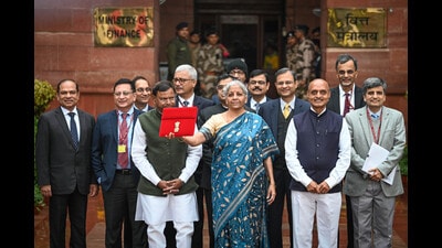 New Delhi, India - Feb. 1, 2024: Nirmala Sitharaman, Union Minister of Finance along with Bhagwat Karad and Pankaj Chaudhary MOS Finance leaves the Finance Ministry carrying the Finance Budget ahead of the presentation of interim Budget 2024 in Parliament at North Block in New Delhi, India, on Thursday, February 1, 2024. (Photo by Sanchit Khanna/ Hindustan Times) (Hindustan Times) New Delhi, India - Feb. 1, 2024: Nirmala Sitharaman, Union Minister of Finance along with Bhagwat Karad and Pankaj Chaudhary MOS Finance leaves the Finance Ministry carrying the Finance Budget ahead of the presentation of interim Budget 2024 in Parliament at North Block in New Delhi, India, on Thursday, February 1, 2024. (Photo by Sanchit Khanna/ Hindustan Times) (Hindustan Times)