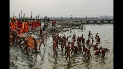 Newly-initiated Naga Sadhus, or Hindu holy men, take a dip in the sacred waters of the river Ganges after participating in religious rituals during the ongoing Mahakumbh Mela festival in Prayagraj on January 24, 2025. (Niharika KULKARNI / AFP) Newly-initiated Naga Sadhus, or Hindu holy men, take a dip in the sacred waters of the river Ganges after participating in religious rituals during the ongoing Mahakumbh Mela festival in Prayagraj on January 24, 2025. (Niharika KULKARNI / AFP)