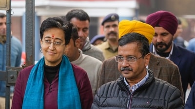 New Delhi: AAP national convener Arvind Kejriwal with Delhi Chief Minister and party leader Atishi leaves from the Election Commission office, in New Delhi, (PTI) New Delhi: AAP national convener Arvind Kejriwal with Delhi Chief Minister and party leader Atishi leaves from the Election Commission office, in New Delhi, (PTI)