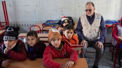The United Nations Children's Fund, has released a report that says heatwaves, cyclones, flooding, and other extreme weather caused at least 242 million children in 85 countries to miss school last year. (REUTERS/Karam al-Masri)