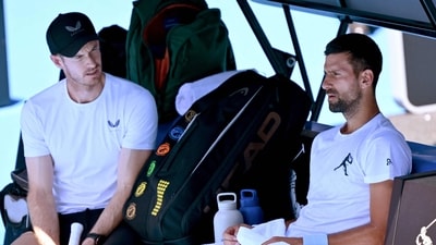 Serbia's Novak Djokovic (R) speaks to coach Andy Murray during a training session. (AFP) Serbia's Novak Djokovic (R) speaks to coach Andy Murray during a training session. (AFP)