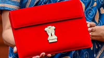 Budget 2025: The Budget tablet, carried by the finance minister, is wrapped in a traditional 'Bahi-Khaata' style pouch. (File/ANI) Budget 2025: The Budget tablet, carried by the finance minister, is wrapped in a traditional 'Bahi-Khaata' style pouch. (File/ANI)