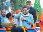**EDS: THIRD PARTY** In this image posted by @pushkardhami via X on Jan. 13, 2025, Uttarakhand Chief Minister Pushkar Singh Dhami during a roadshow, in the Herbertpur Nagar Palika area in Dehradun. (@pushkardhami via PTI Photo) (PTI01_13_2025_000440B) **EDS: THIRD PARTY** In this image posted by @pushkardhami via X on Jan. 13, 2025, Uttarakhand Chief Minister Pushkar Singh Dhami during a roadshow, in the Herbertpur Nagar Palika area in Dehradun. (@pushkardhami via PTI Photo) (PTI01_13_2025_000440B)