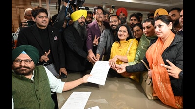 AAP’s Prem Lata, along with party leaders and councillors, filing her nomination at the MC Office in Chandigarh on Saturday. (Ravi Kumar/HT) AAP’s Prem Lata, along with party leaders and councillors, filing her nomination at the MC Office in Chandigarh on Saturday. (Ravi Kumar/HT)