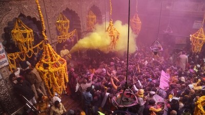 A priest (L) throws coloured powder over Hindu devotees during 'Basant Panchami' festival celebrations, which mark the preparations for the arrival of spring, inside the Sri Bankey Bihari temple in Vrindavan. (File image) (AFP) A priest (L) throws coloured powder over Hindu devotees during 'Basant Panchami' festival celebrations, which mark the preparations for the arrival of spring, inside the Sri Bankey Bihari temple in Vrindavan. (File image) (AFP)