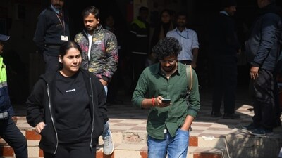 Aspirants coming out after appeared in the Common Management Admission Test (CMAT) exam at an examination centre at Patliputra in Patna. (Santosh Kumar ) Aspirants coming out after appeared in the Common Management Admission Test (CMAT) exam at an examination centre at Patliputra in Patna. (Santosh Kumar )