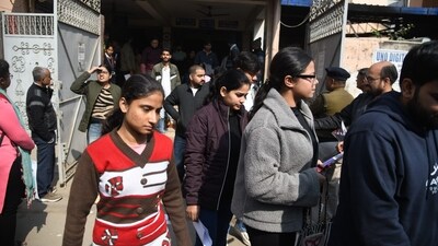 Aspirants coming out after appeared in the Common Management Admission Test (CMAT) exam at an examination centre at Patliputra in Patna. (Santosh Kumar ) Aspirants coming out after appeared in the Common Management Admission Test (CMAT) exam at an examination centre at Patliputra in Patna. (Santosh Kumar )