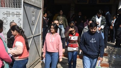 Candidates coming out after appeared in the Common Management Admission Test (CMAT) exam at an examination centre at Patliputra in Patna. (Santosh Kumar ) Candidates coming out after appeared in the Common Management Admission Test (CMAT) exam at an examination centre at Patliputra in Patna. (Santosh Kumar )