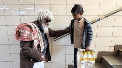 The boy is carrying a large bag. He introduces himself as Gulzar. (HT Photo) The boy is carrying a large bag. He introduces himself as Gulzar. (HT Photo)