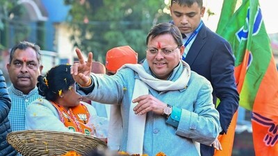 **EDS: THIRD PARTY** In this image posted by @pushkardhami via X on Jan. 13, 2025, Uttarakhand Chief Minister Pushkar Singh Dhami during a roadshow, in the Herbertpur Nagar Palika area in Dehradun. (@pushkardhami via PTI Photo) (PTI01_13_2025_000440B) (@pushkardhami) **EDS: THIRD PARTY** In this image posted by @pushkardhami via X on Jan. 13, 2025, Uttarakhand Chief Minister Pushkar Singh Dhami during a roadshow, in the Herbertpur Nagar Palika area in Dehradun. (@pushkardhami via PTI Photo) (PTI01_13_2025_000440B) (@pushkardhami)