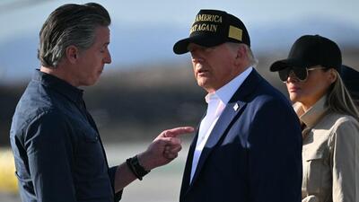US President Donald Trump and First Lady Melania Trump are greeted by California Governor Gavin Newsom upon arrival at Los Angeles International Airport in Los Angeles, California, on Friday. (AFP) US President Donald Trump and First Lady Melania Trump are greeted by California Governor Gavin Newsom upon arrival at Los Angeles International Airport in Los Angeles, California, on Friday. (AFP)
