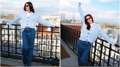 In another look, she exudes laid-back charm in a white shirt layered with a baby blue cardigan and loose-fitted denim pants. (Instagram/@shanayakapoor02) In another look, she exudes laid-back charm in a white shirt layered with a baby blue cardigan and loose-fitted denim pants. (Instagram/@shanayakapoor02)