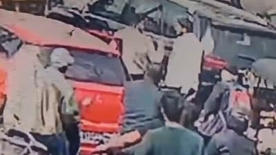 While the incident took place on Tuesday, it came to light after a video surfaced on social media showing the two-wheeler -trapped between two cars at a traffic signal. (X/@harish_malusare) While the incident took place on Tuesday, it came to light after a video surfaced on social media showing the two-wheeler -trapped between two cars at a traffic signal. (X/@harish_malusare)