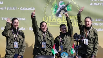 Four female Israeli soldiers, who had been held in Gaza since the deadly October 7, 2023 attack, are released by Hamas militants as part of a ceasefire and a hostages-prisoners swap deal between Hamas and Israel, in Gaza City, January 25, 2025. (REUTERS)