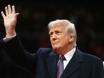 US President Donald Trump waves as he arrives at the inaugural parade inside Capitol One Arena in Washington, DC. US President Donald Trump waves as he arrives at the inaugural parade inside Capitol One Arena in Washington, DC.