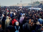 Palestinians wait to be allowed to return to their homes in northern Gaza after they were displaced to the south at Israel's order during the war, amid a ceasefire between Israel and Hamas, in the central Gaza Strip, January 26, 2025. 