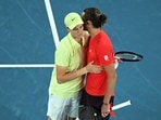 Italy's Jannik Sinner embraces Germany's Alexander Zverev.