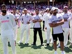 India's Jasprit Bumrah (L) reacts with teammates during the trophy ceremony after the fifth cricket Test match between Australia and India at The SCG in Sydney on January 5 India's Jasprit Bumrah (L) reacts with teammates during the trophy ceremony after the fifth cricket Test match between Australia and India at The SCG in Sydney on January 5