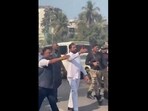 In a video, an injured man is seen being carried by two men followed by Eknath Shinde signaling his convoy to make way for them. In a video, an injured man is seen being carried by two men followed by Eknath Shinde signaling his convoy to make way for them.