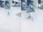 The man, in blue shirt, rushed towards the falling child and broke her fall. The man, in blue shirt, rushed towards the falling child and broke her fall.