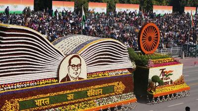 A tableau celebrating 75 years of Indian Constitution on display during the 76th Republic Day parade at Kartavya Path, in New Delhi, on Sunday. (PTI)