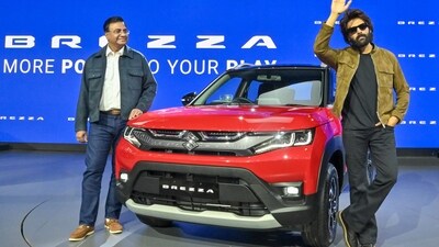 Senior Executive Officer of Marketing and Sales Maruti Suzuki India, Partho Bannerjee and actor Kartik Aryan during the launch of new marketing campaign of Maruti Brezza. (ANI) Senior Executive Officer of Marketing and Sales Maruti Suzuki India, Partho Bannerjee and actor Kartik Aryan during the launch of new marketing campaign of Maruti Brezza. (ANI)