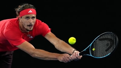 Zverev said, “It sucks standing next to this thing and not being able to touch it.” (AP) Zverev said, “It sucks standing next to this thing and not being able to touch it.” (AP)