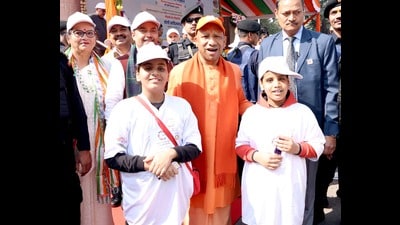 Chief minister Yogi Adityanath after hoisting the Tricolour at his residence in Lucknow on Sunday (HT Photo) Chief minister Yogi Adityanath after hoisting the Tricolour at his residence in Lucknow on Sunday (HT Photo)