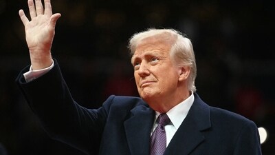 US President Donald Trump waves as he arrives at the inaugural parade inside Capitol One Arena in Washington, DC. (AFP) US President Donald Trump waves as he arrives at the inaugural parade inside Capitol One Arena in Washington, DC. (AFP)