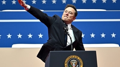 Tesla and SpaceX CEO Elon Musk gestures as he speaks during the inaugural parade inside Capitol One Arena, in Washington, DC, on January 20, 2025. (AFP)