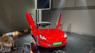 The MG Cyberster, an electric convertible roadster with scissor doors and stunning design, will arrive by March 2025. With a twin-motor setup, it promises 0-100 kmph in just 3.2 seconds. (HT Photo) The MG Cyberster, an electric convertible roadster with scissor doors and stunning design, will arrive by March 2025. With a twin-motor setup, it promises 0-100 kmph in just 3.2 seconds. (HT Photo)