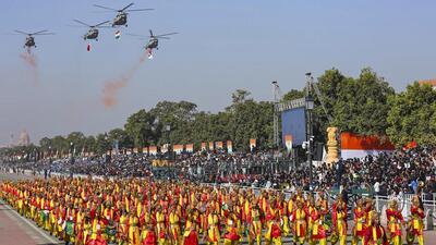 Mi-17 IV choppers of the Indian Air Force’s (IAF) 129 Helicopter Unit shower flower petals in 'Dhwaj Formation' during the 76th Republic Day parade at the Kartavya Path, in New Delhi. (PIB) Mi-17 IV choppers of the Indian Air Force’s (IAF) 129 Helicopter Unit shower flower petals in 'Dhwaj Formation' during the 76th Republic Day parade at the Kartavya Path, in New Delhi. (PIB)