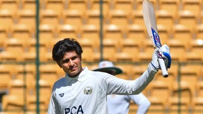Punjab's captain Shubman Gill celebrates his century on the third day of a Ranji Trophy cricket match between Karnataka and Punjab, at the M Chinnaswamy Stadium, in Bengaluru (PTI) Punjab's captain Shubman Gill celebrates his century on the third day of a Ranji Trophy cricket match between Karnataka and Punjab, at the M Chinnaswamy Stadium, in Bengaluru (PTI)