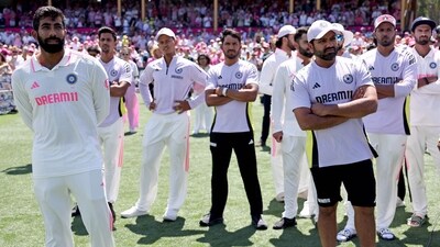 India's Jasprit Bumrah (L) reacts with teammates during the trophy ceremony after the fifth cricket Test match between Australia and India at The SCG in Sydney on January 5 (AFP) India's Jasprit Bumrah (L) reacts with teammates during the trophy ceremony after the fifth cricket Test match between Australia and India at The SCG in Sydney on January 5 (AFP)