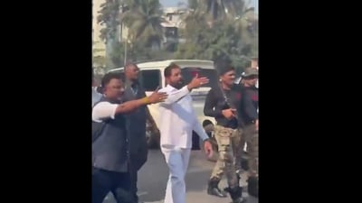 In a video, an injured man is seen being carried by two men followed by Eknath Shinde signaling his convoy to make way for them. (X/@ANI) In a video, an injured man is seen being carried by two men followed by Eknath Shinde signaling his convoy to make way for them. (X/@ANI)