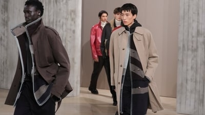 Models wear creations for the men's Hermes Fall-Winter 2025-26 collection. (AP) Models wear creations for the men's Hermes Fall-Winter 2025-26 collection. (AP)