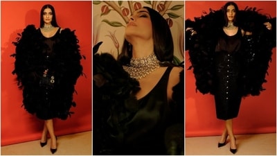 Styled by Rhea Kapoor, Sonam Kapoor's Sabyasachi 2024 couture look features a silk blouse, a pencil skirt, and a feather-adorned coat. Being the brand ambassador of Dior, Sonam carried a black Lady Dior bag with the Sabyasachi look. She further accessorised the ensemble with an eye-catching diamond choker necklace, statement rings, gold heritage earrings, and black pumps. Styled by Rhea Kapoor, Sonam Kapoor's Sabyasachi 2024 couture look features a silk blouse, a pencil skirt, and a feather-adorned coat. Being the brand ambassador of Dior, Sonam carried a black Lady Dior bag with the Sabyasachi look. She further accessorised the ensemble with an eye-catching diamond choker necklace, statement rings, gold heritage earrings, and black pumps. 