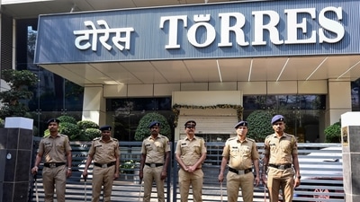 Police personnel stand guard outside Torres Company’s office. (ANI) Police personnel stand guard outside Torres Company’s office. (ANI)